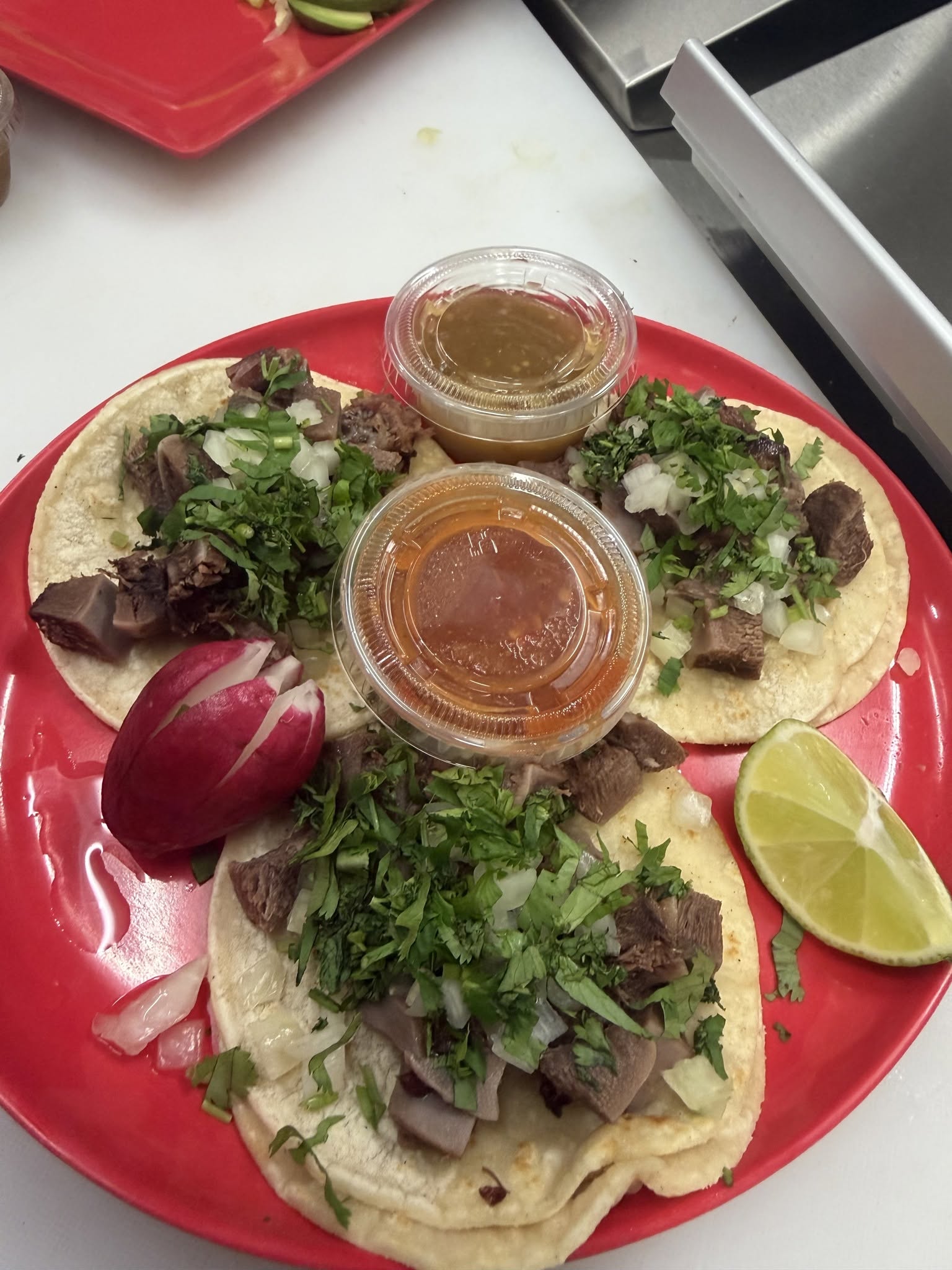 Street tacos with onion, cilantro and salsa at Jake's Meats in Quincy, WA